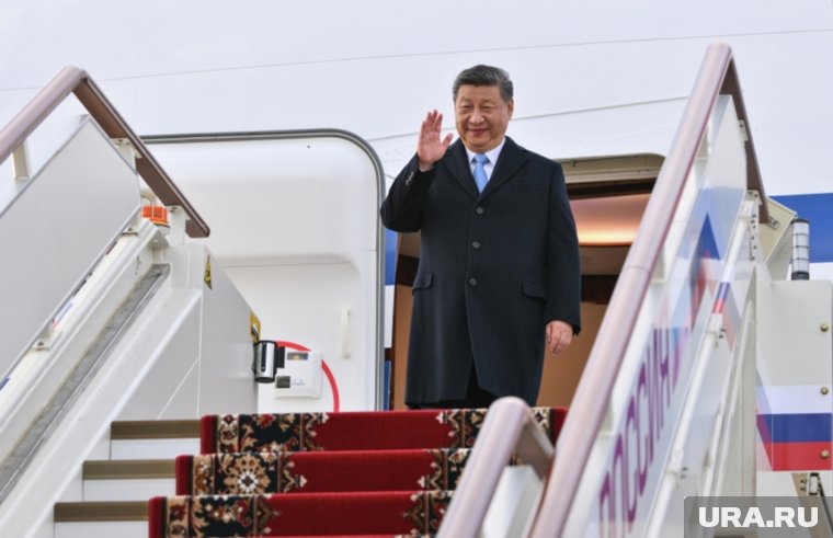 Почетный караул и толпа с флагами: как встречали Си Цзиньпина в Москве. Фоторепортаж